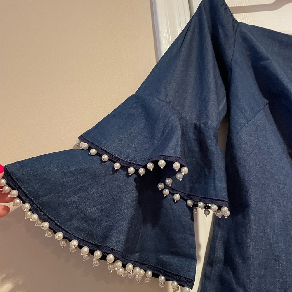 Brand new off the shoulder navy blue denim top.